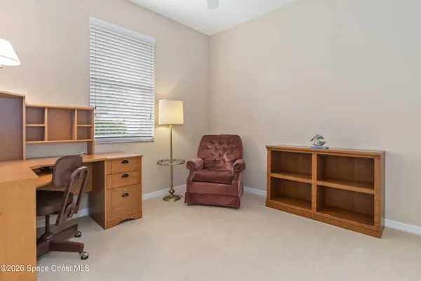 a view of a dining room with furniture wooden floor and chandelier