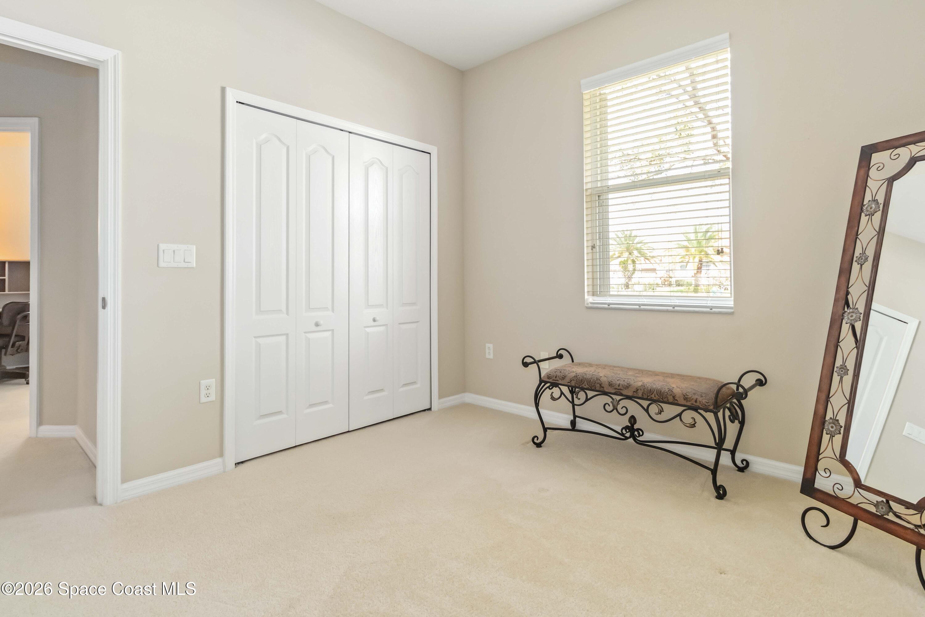 6604 Pico Street Melbourne, FL 32940 - Photo 19 of 36 an empty room with windows