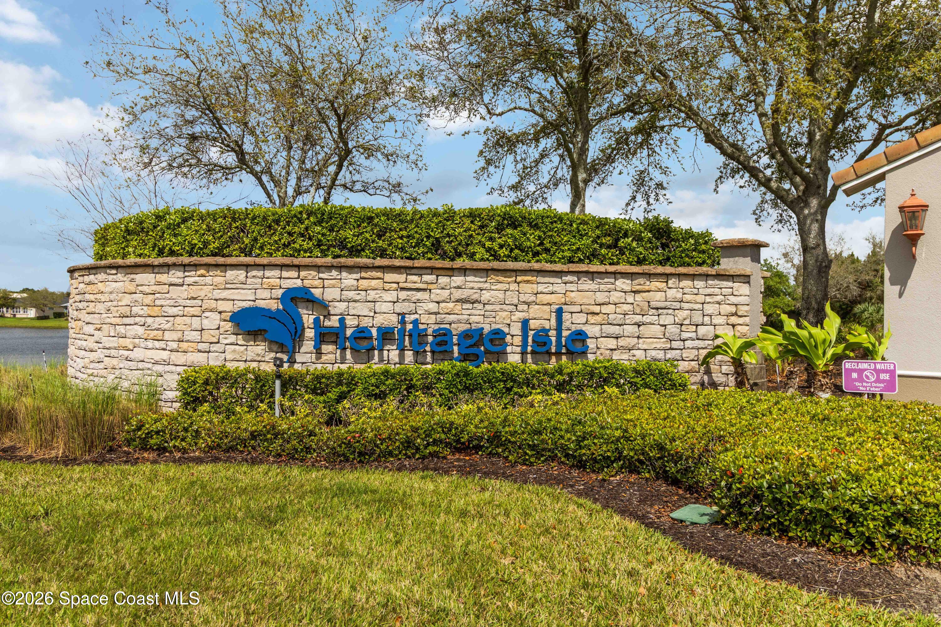 6604 Pico Street Melbourne, FL 32940 - Photo 2 of 36 a view of a garden with large trees