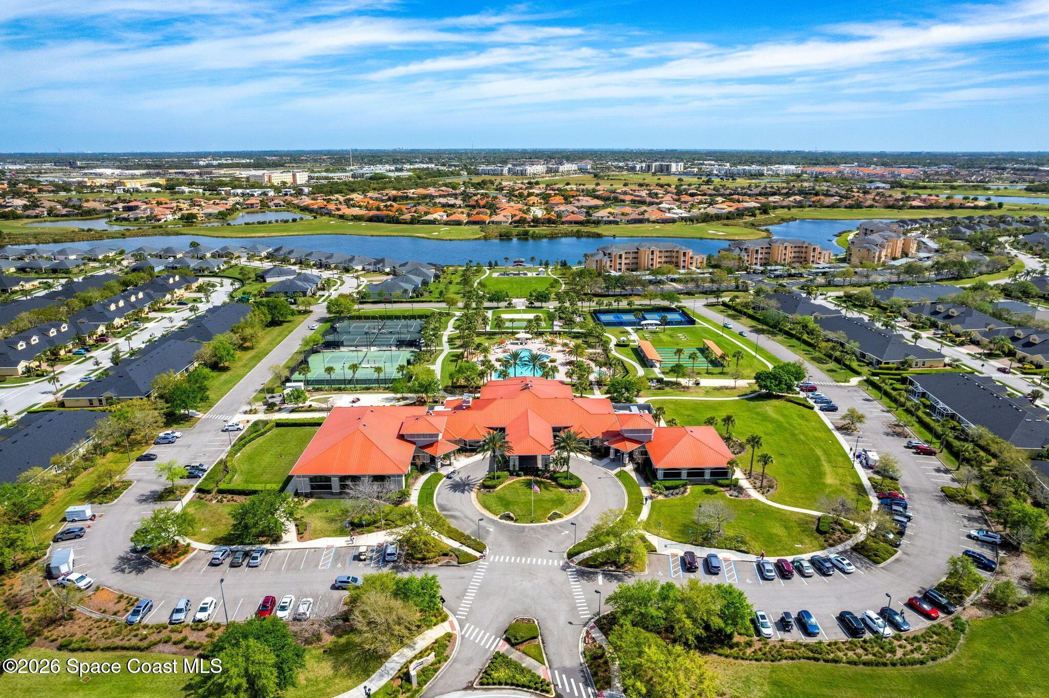 6604 Pico Street Melbourne, FL 32940 - Photo 24 of 36 an aerial view of residential houses with outdoor space