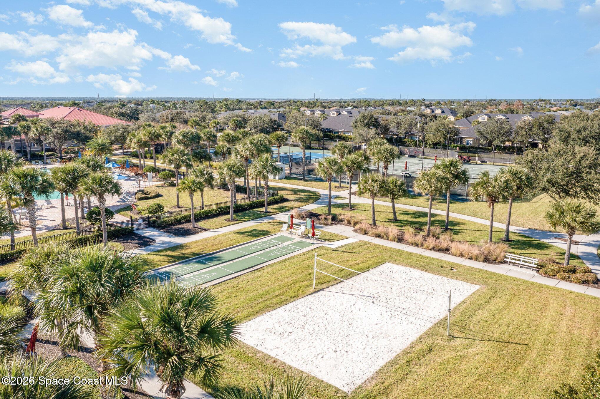 6604 Pico Street Melbourne, FL 32940 - Photo 30 of 36 a view of a swimming pool with an ocean view