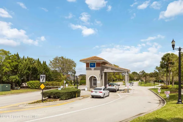 a room with a sink and a mirror