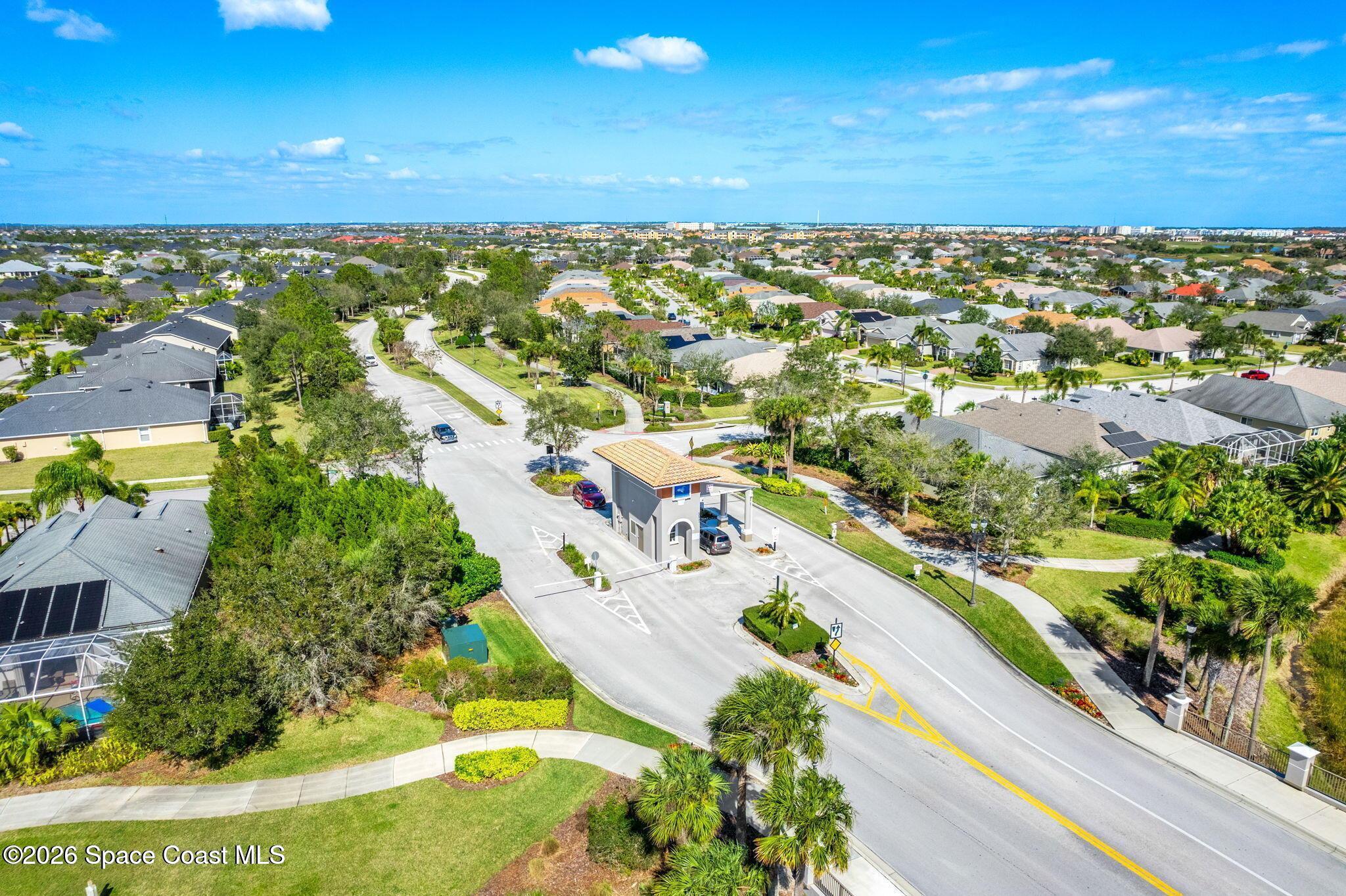 6604 Pico Street Melbourne, FL 32940 - Photo 6 of 36 an aerial view of a city