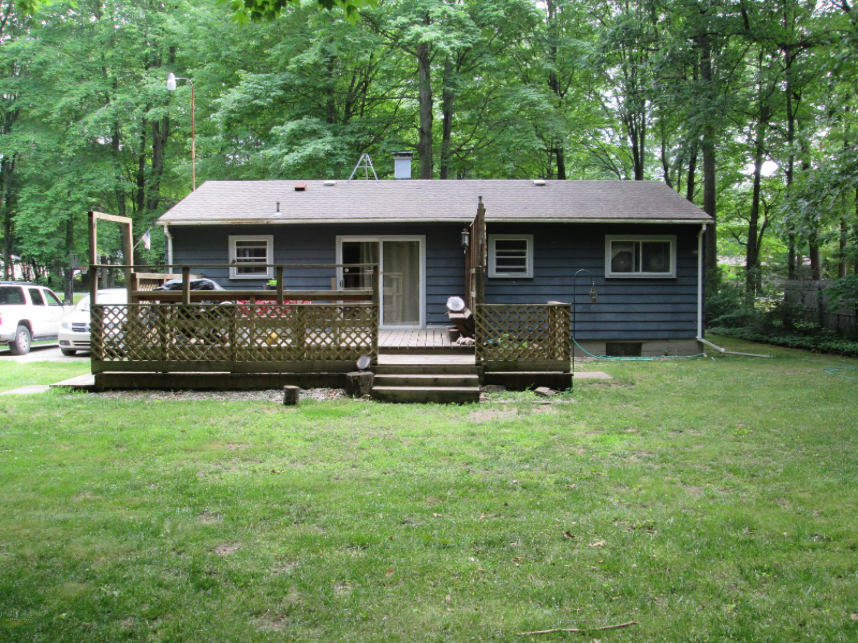5240 Duck Lake Road Whitehall, MI 49461 - Photo 2 of 13 5240 Duck Lake Rd back