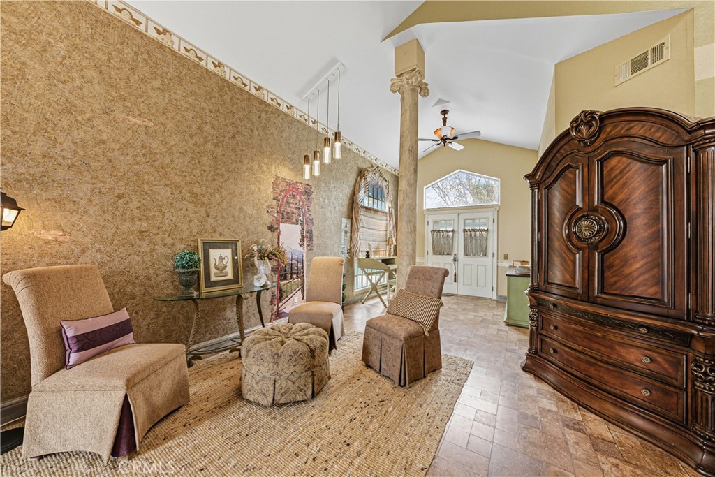 1320-1320 Stonebrook Drive Lompoc, CA 93436 - Photo 19 of 72 a living room with furniture and a fireplace