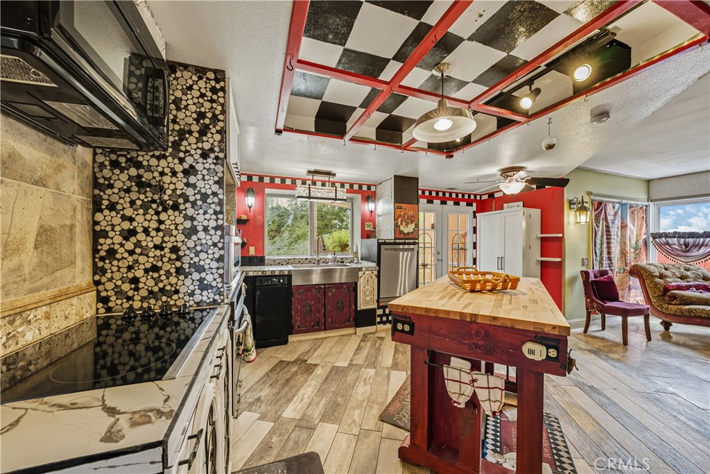1320-1320 Stonebrook Drive Lompoc, CA 93436 - Photo 26 of 72 a view of a dining room with furniture window and wooden floor