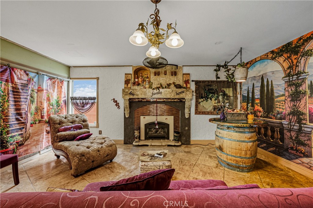 1320-1320 Stonebrook Drive Lompoc, CA 93436 - Photo 35 of 72 a living room with furniture and a fireplace