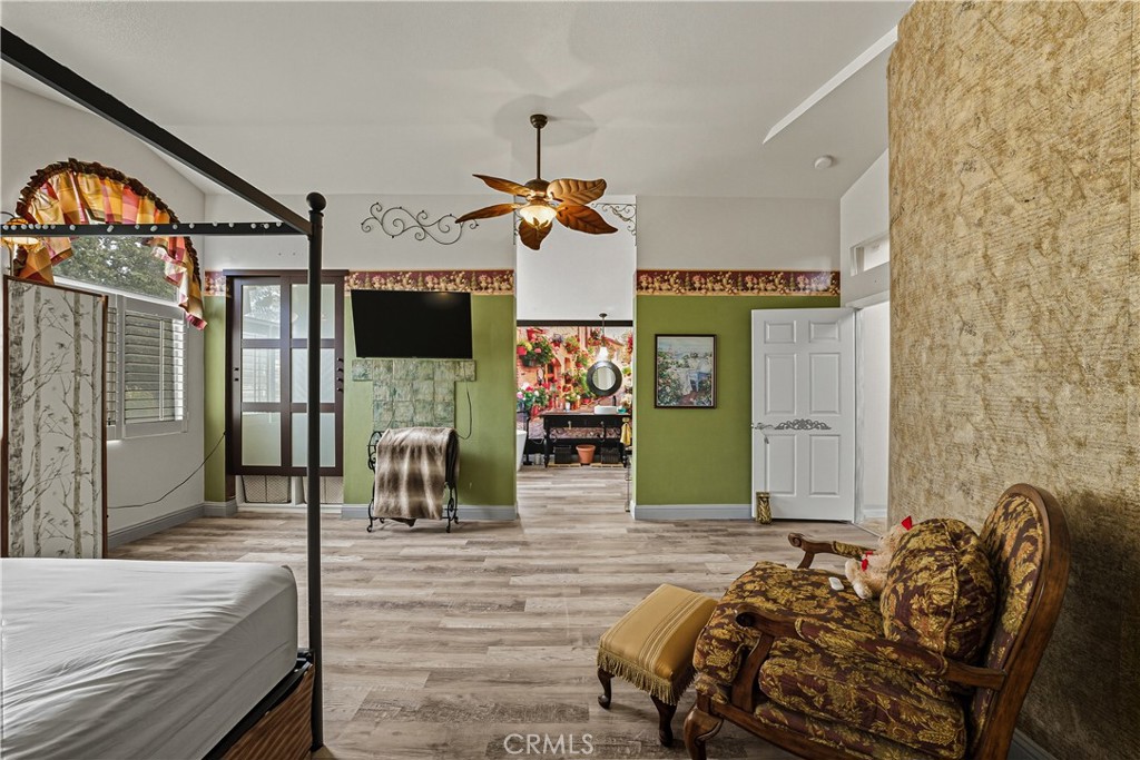 1320-1320 Stonebrook Drive Lompoc, CA 93436 - Photo 47 of 72 a bedroom with a bed a mirror on dresser and a flat screen tv