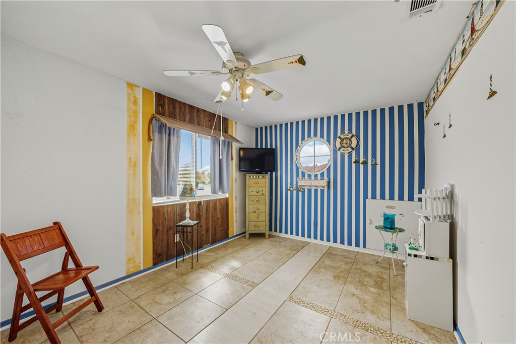 1320-1320 Stonebrook Drive Lompoc, CA 93436 - Photo 53 of 72 a view of hallway with furniture and a chandelier