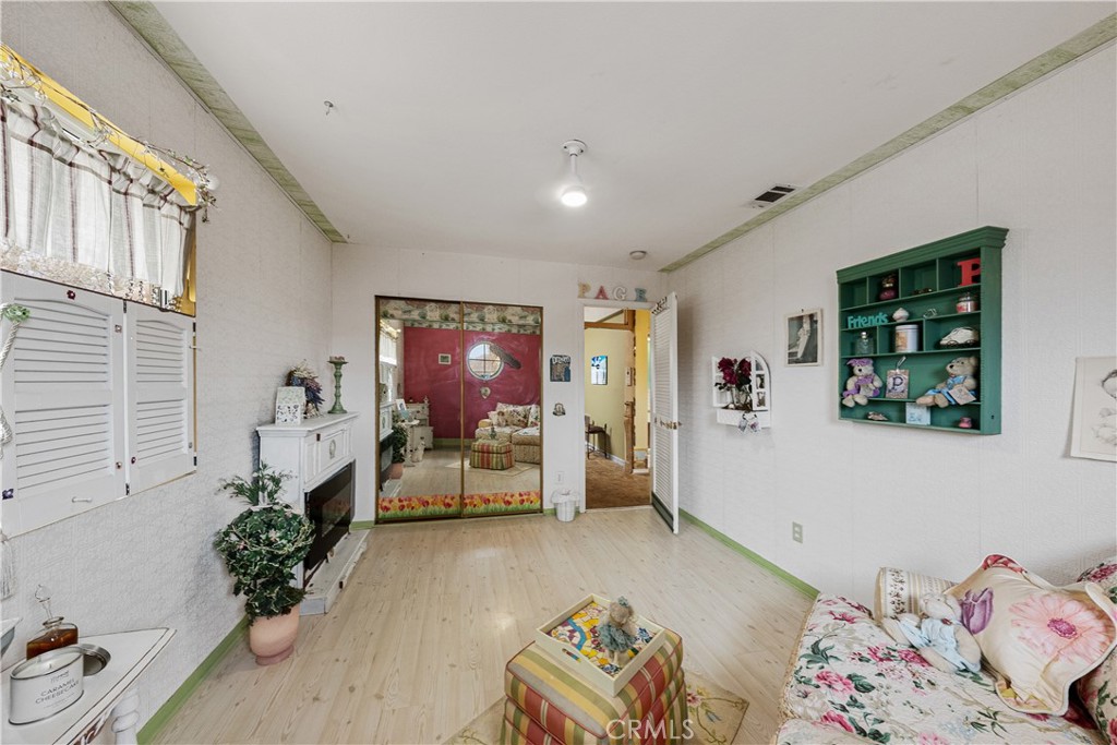 1320-1320 Stonebrook Drive Lompoc, CA 93436 - Photo 62 of 72 a bedroom with furniture and a couch