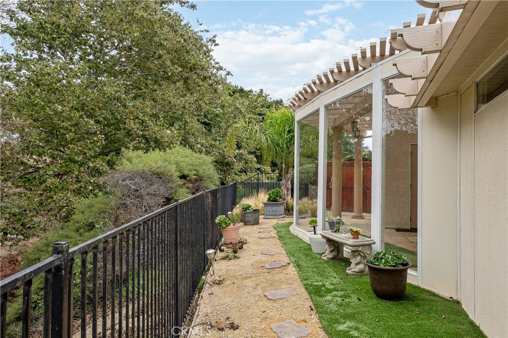 1320-1320 Stonebrook Drive Lompoc, CA 93436 - Photo 70 of 72 a view of a patio with a table and chairs