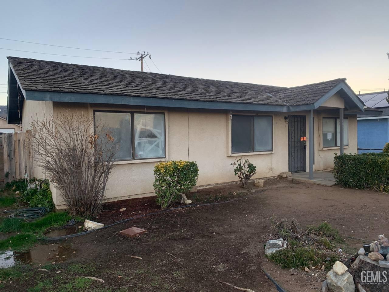 Undisclosed Address Tehachapi, CA 93561 - Photo 2 of 10 a front view of house with yard outdoor seating and barbeque oven
