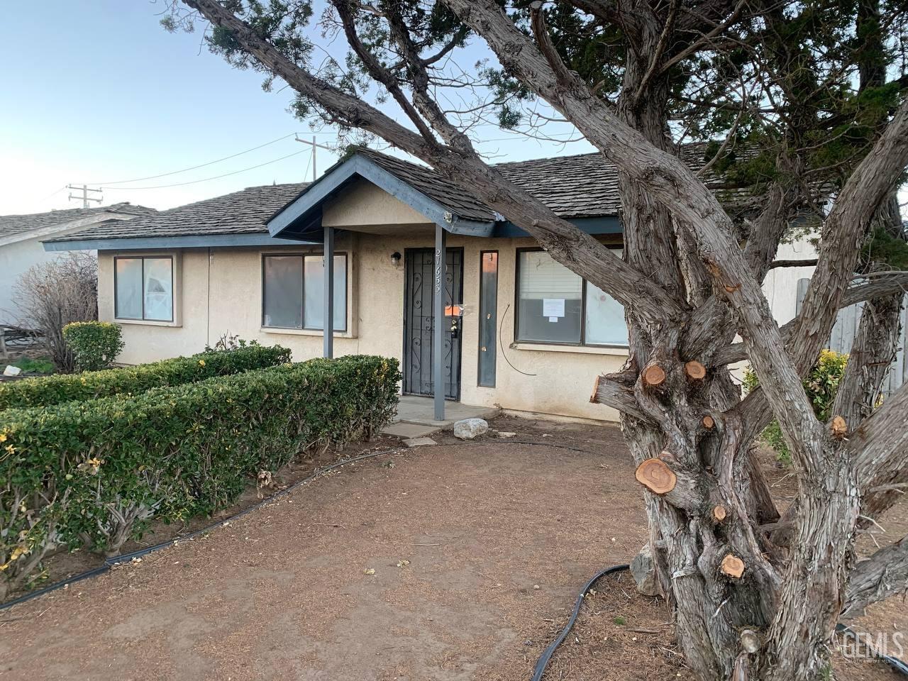 Undisclosed Address Tehachapi, CA 93561 - Photo 3 of 10 a view of a house with a yard and plants