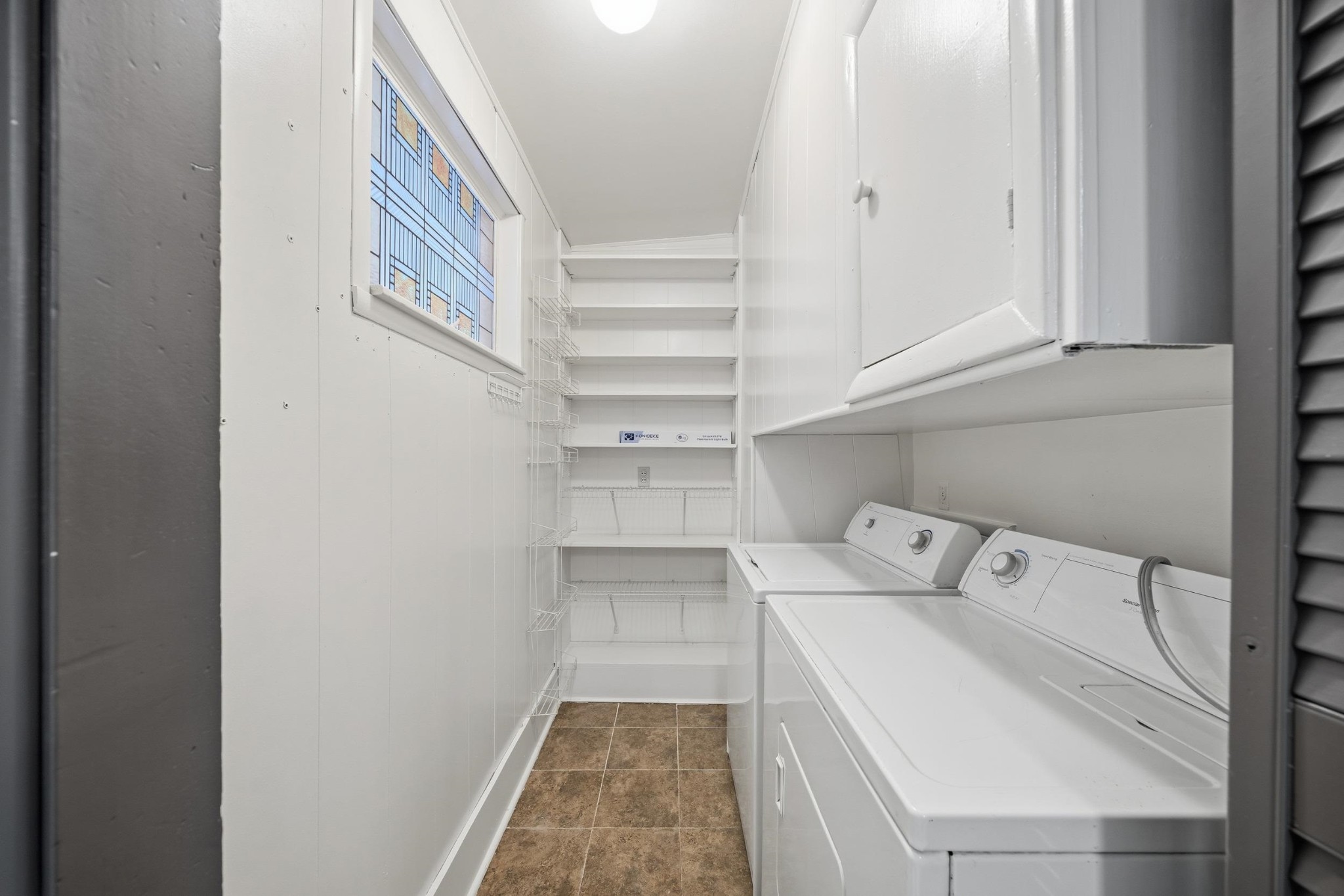 2534 Elmore Park Road Memphis, TN 38134 - Photo 12 of 35 a utility room with dryer and washer