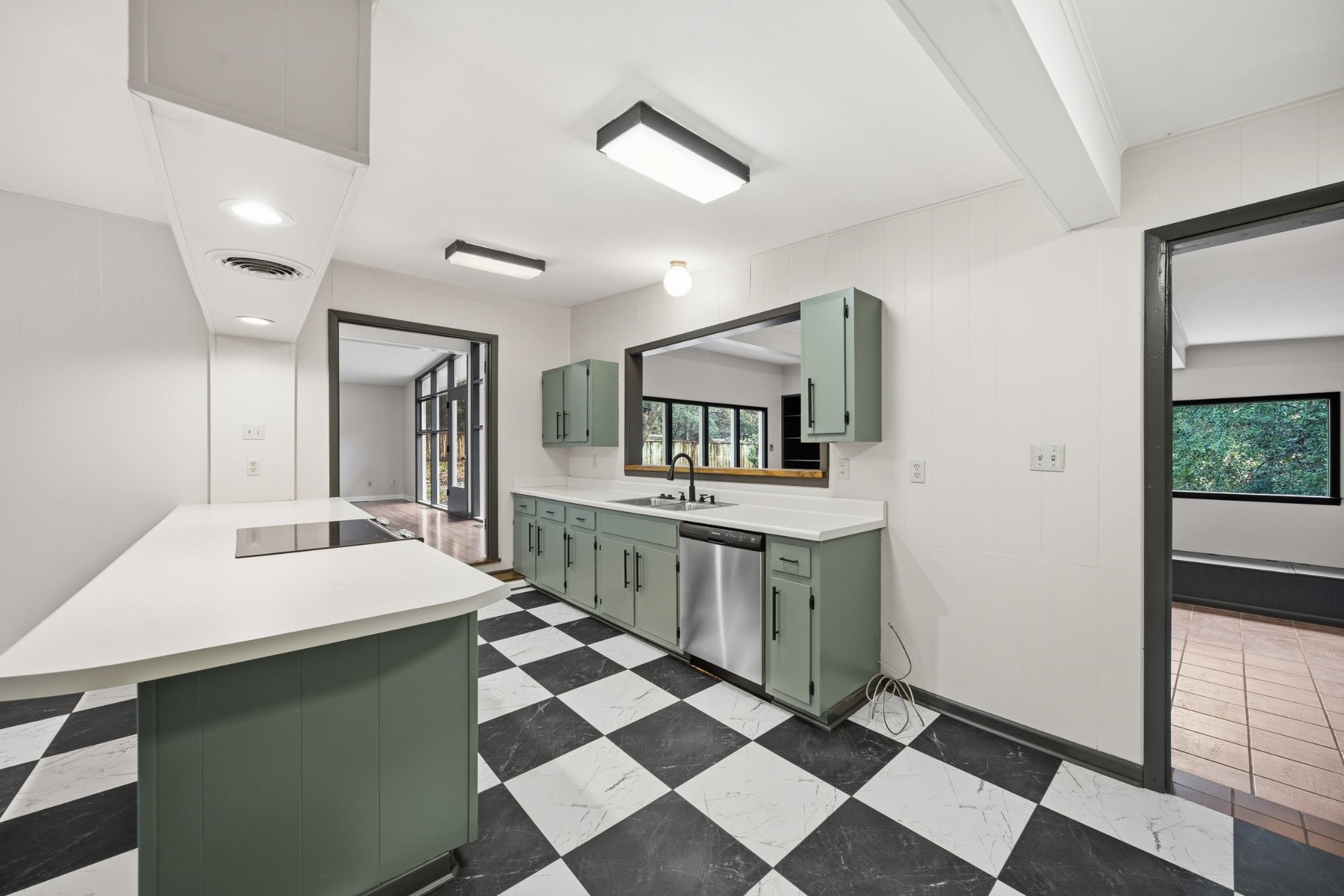 2534 Elmore Park Road Memphis, TN 38134 - Photo 10 of 35 a room with a sink a mirror and cabinets