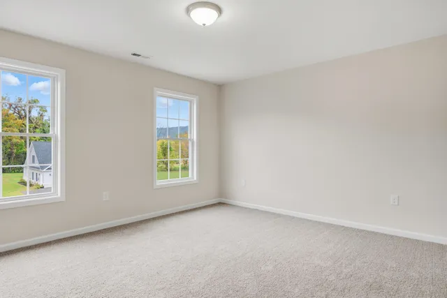 a view of room with hardwood floor