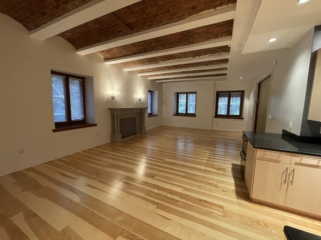 61 Prince Street, Unit 1C Boston, MA 02113 - Photo 2 of 26 a view of a kitchen with a sink and a microwave