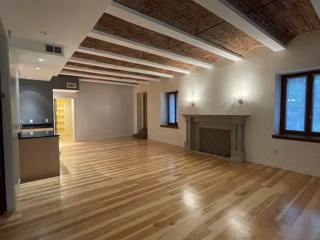 a view of a livingroom with a fireplace
