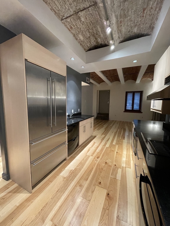 61 Prince Street, Unit 1C Boston, MA 02113 - Photo 5 of 26 a view of kitchen with wooden floor