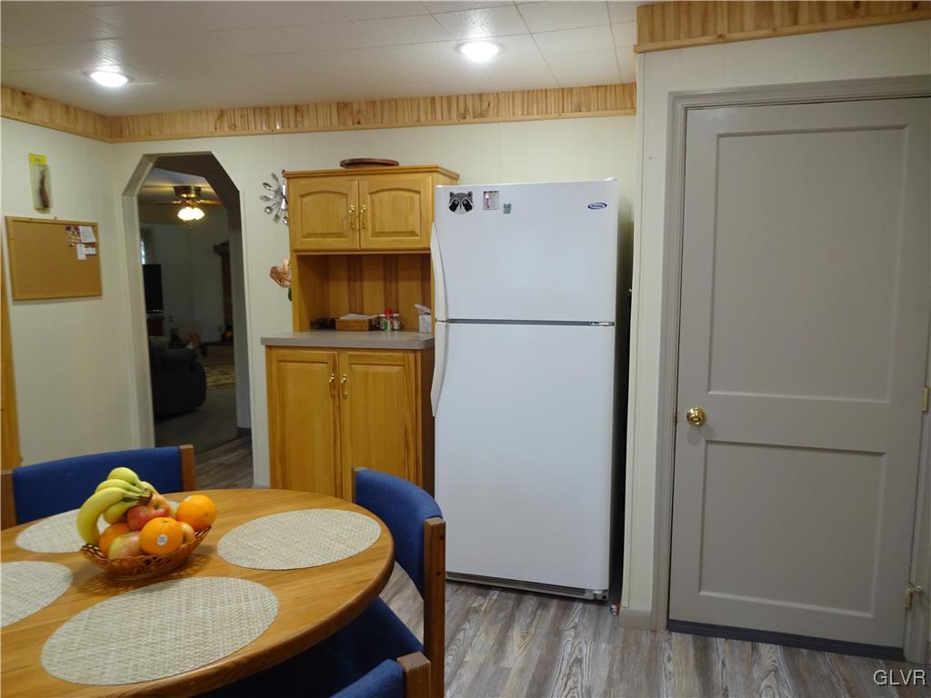 575 School Road Nazareth, PA 18064 - Photo 16 of 48 a kitchen with a refrigerator and wooden floor
