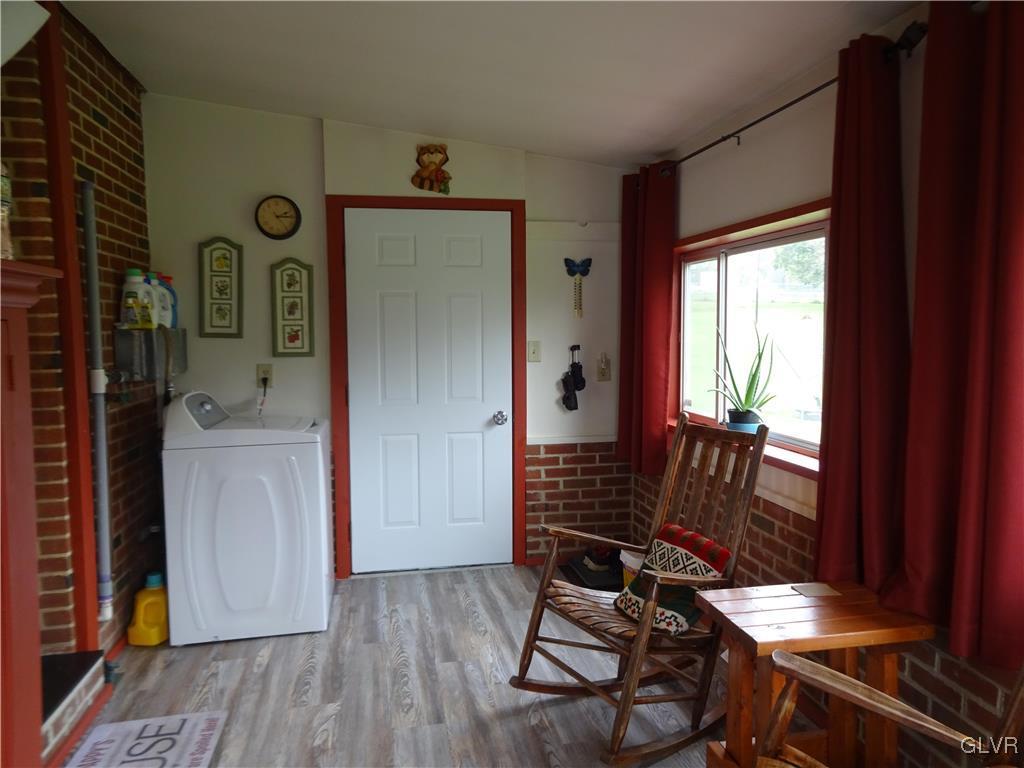 575 School Road Nazareth, PA 18064 - Photo 18 of 48 a room with wooden floor and furniture