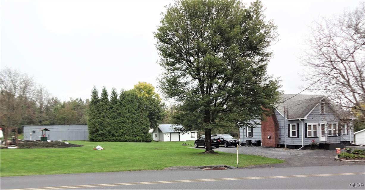 575 School Road Nazareth, PA 18064 - Photo 2 of 48 a city view with tall buildings and a yard