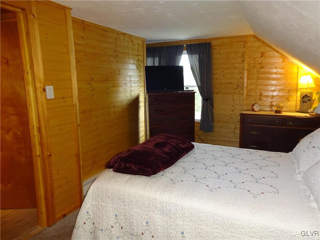 575 School Road Nazareth, PA 18064 - Photo 26 of 48 a bedroom with a bed and a television