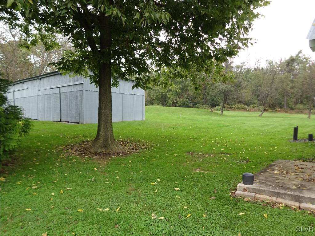 575 School Road Nazareth, PA 18064 - Photo 43 of 48 a view of a backyard with large trees