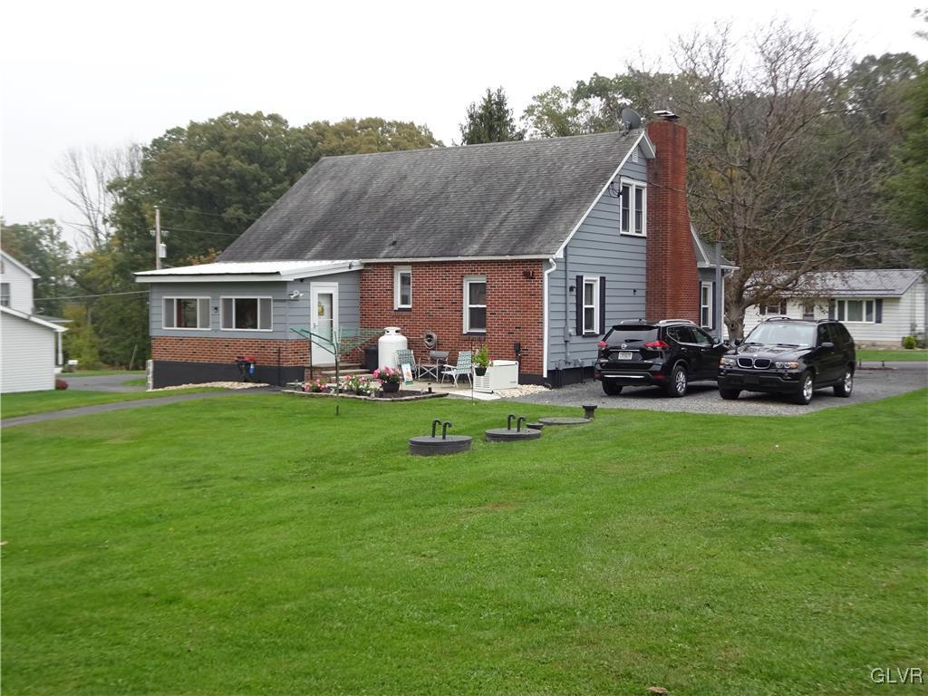 575 School Road Nazareth, PA 18064 - Photo 5 of 48 a front view of house with yard and green space