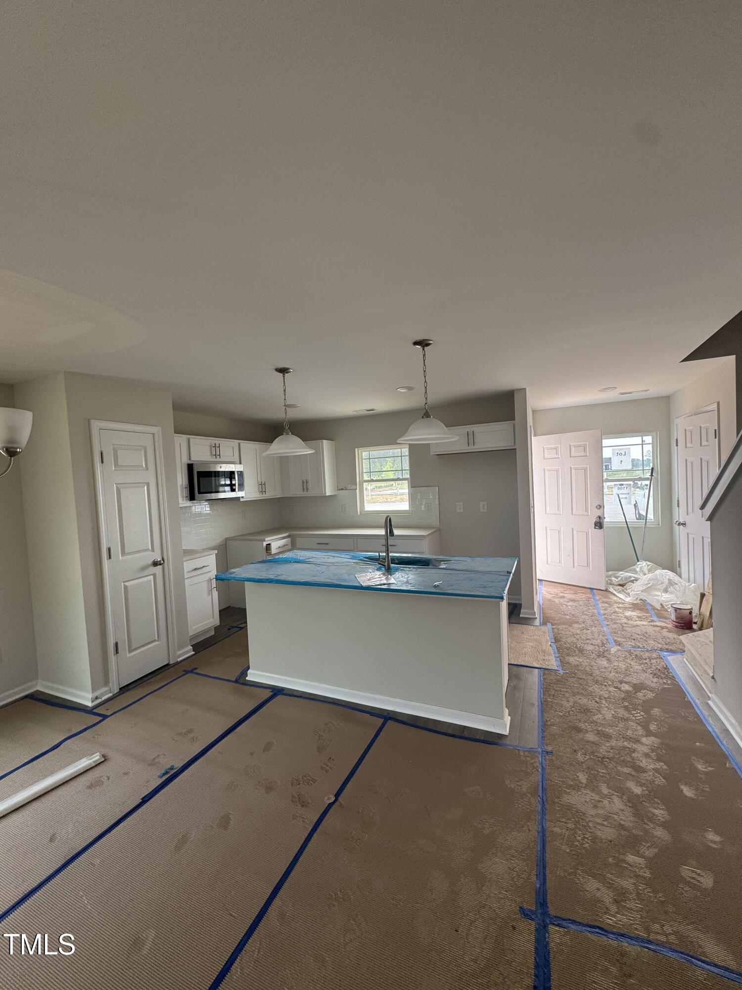 1101 Brookrun Drive Oxford, NC 27565 - Photo 2 of 32 a kitchen with stainless steel appliances kitchen island granite countertop a sink and cabinets