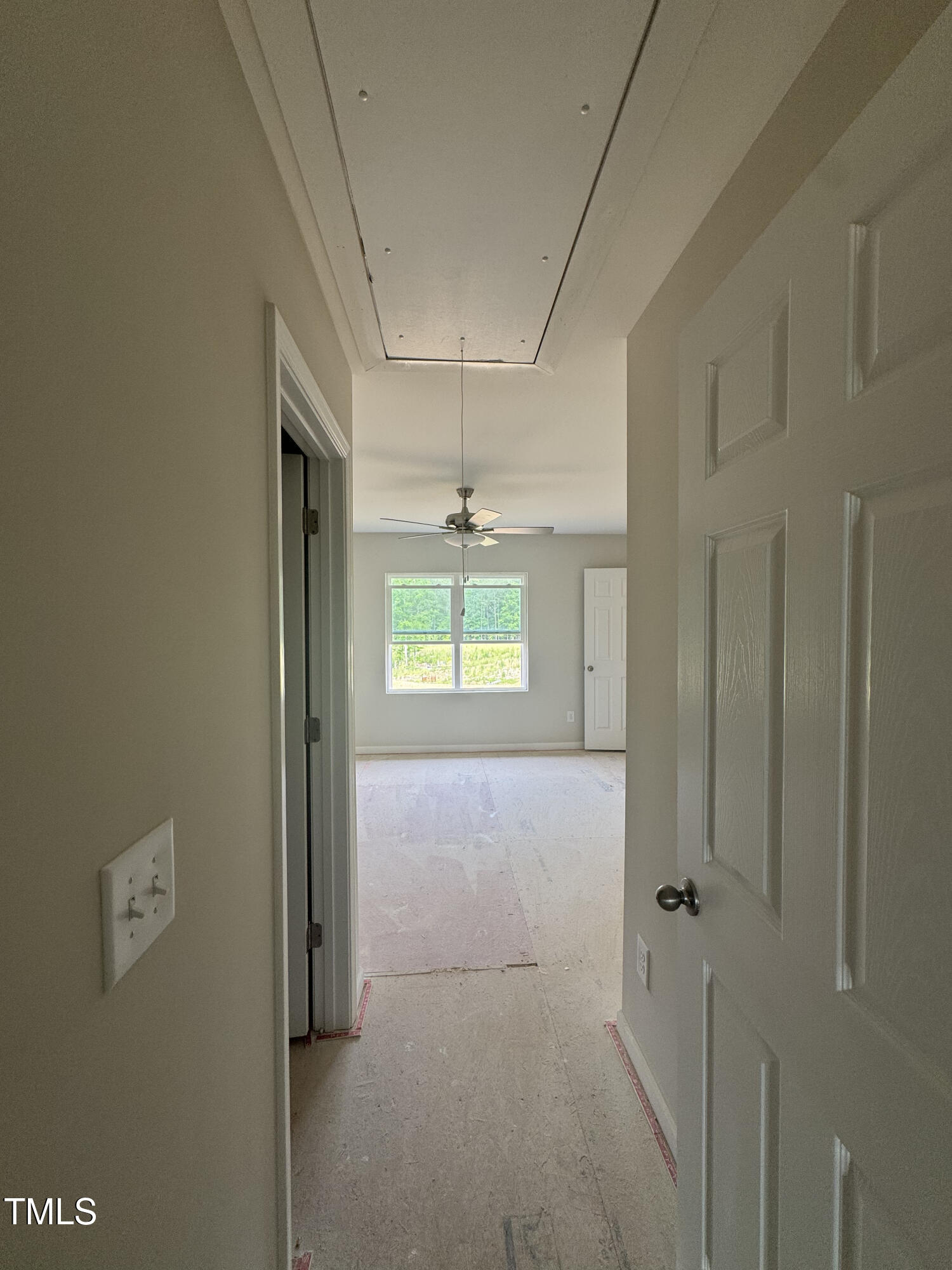 1101 Brookrun Drive Oxford, NC 27565 - Photo 7 of 32 a view of a hallway with a chandelier