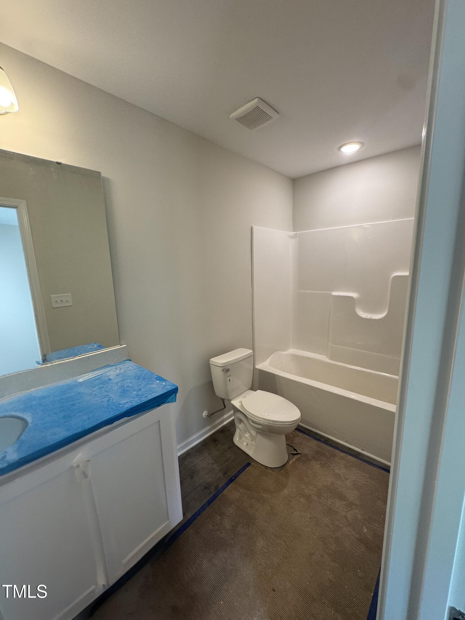 1101 Brookrun Drive Oxford, NC 27565 - Photo 9 of 32 a bathroom with a sink a toilet and shower
