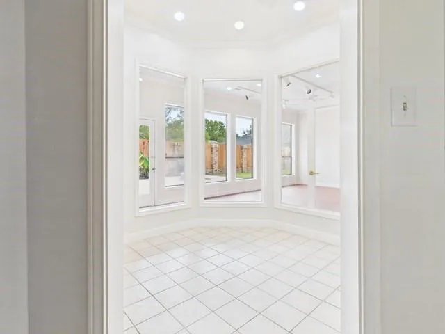 a kitchen that has a sink and a stove top oven