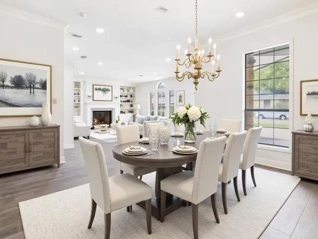 a bedroom with a bed window and couch