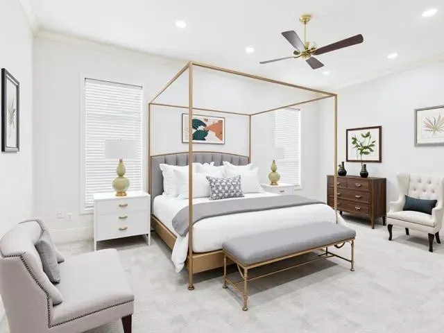 a view of a patio with couches table and chairs and potted plants
