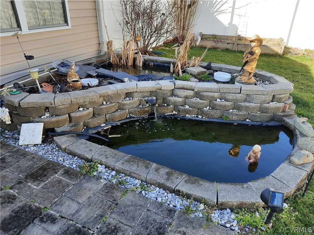 4008 Rotherham Circle Prince George, VA 23875 - Photo 10 of 17 Water Feature with KOI Pond by Stone Patio, off Sc
