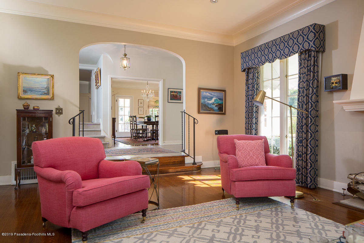 155 Club Road Pasadena, CA 91105 - Photo 11 of 50 a living room with furniture a large window and a fireplace