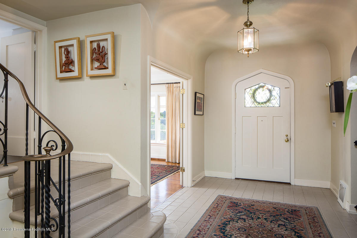 155 Club Road Pasadena, CA 91105 - Photo 4 of 50 a view of a hallway with entryway wooden floor and front door
