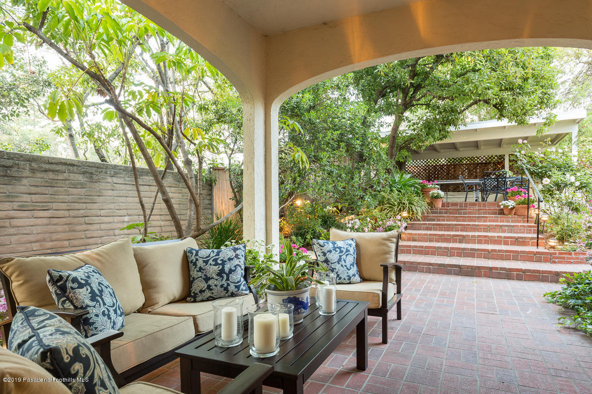 155 Club Road Pasadena, CA 91105 - Photo 45 of 50 a view of a patio with couches plants and large trees