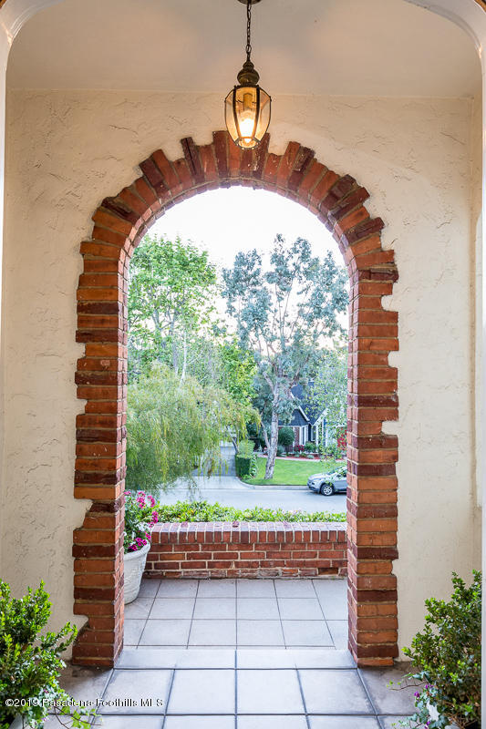 155 Club Road Pasadena, CA 91105 - Photo 6 of 50 a front view of a house with a yard