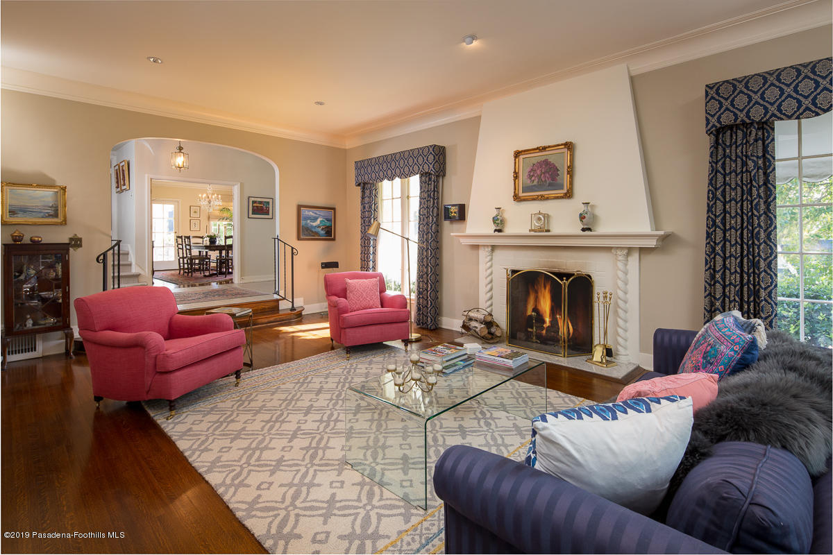 155 Club Road Pasadena, CA 91105 - Photo 10 of 50 a living room with furniture a fireplace and a large window