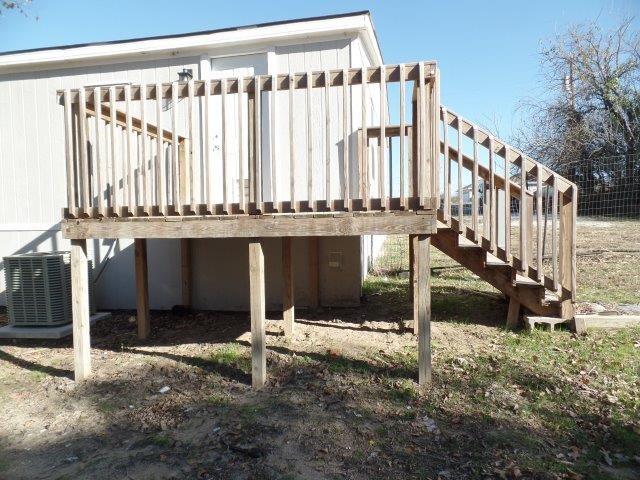 178 Valley Lake Lane Springtown, TX 76082 - Photo 21 of 25 a view of entryway with wooden stairs