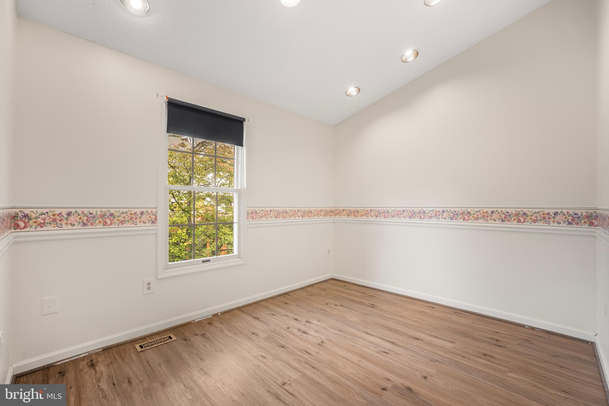 5522 April Journey, Unit 11 Columbia, MD 21044 - Photo 25 of 34 a view of an empty room and a window