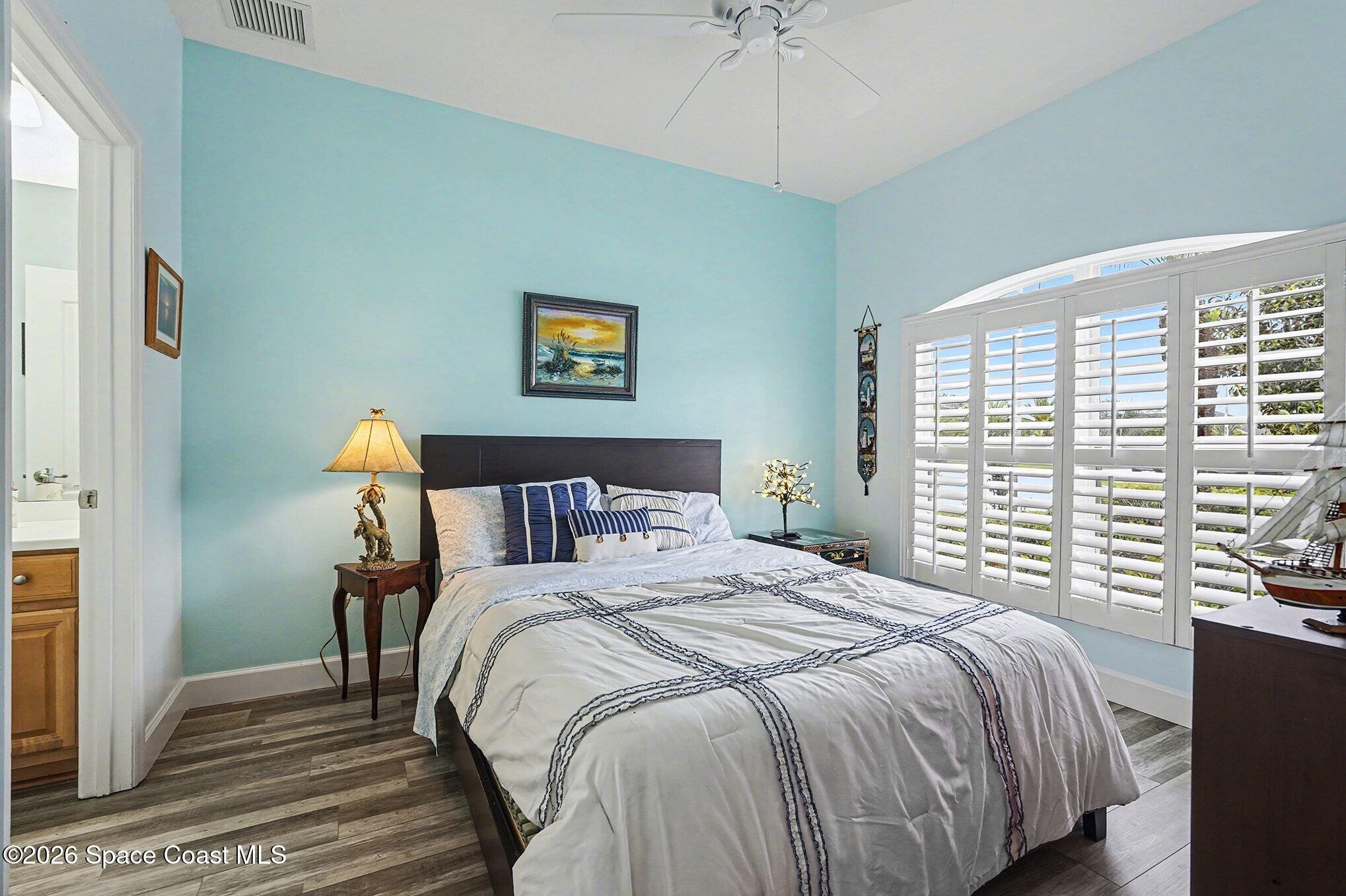 3051 Le Conte Street Melbourne, FL 32940 - Photo 16 of 32 a bedroom with a bed and a window
