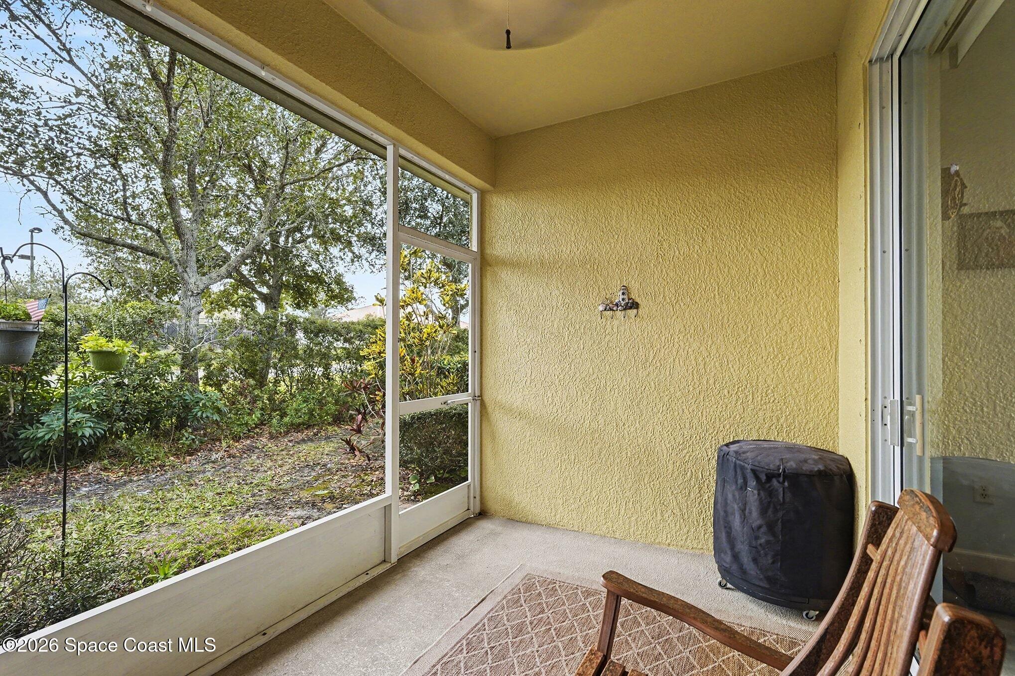 3051 Le Conte Street Melbourne, FL 32940 - Photo 22 of 32 a view of a room with furniture and a gate