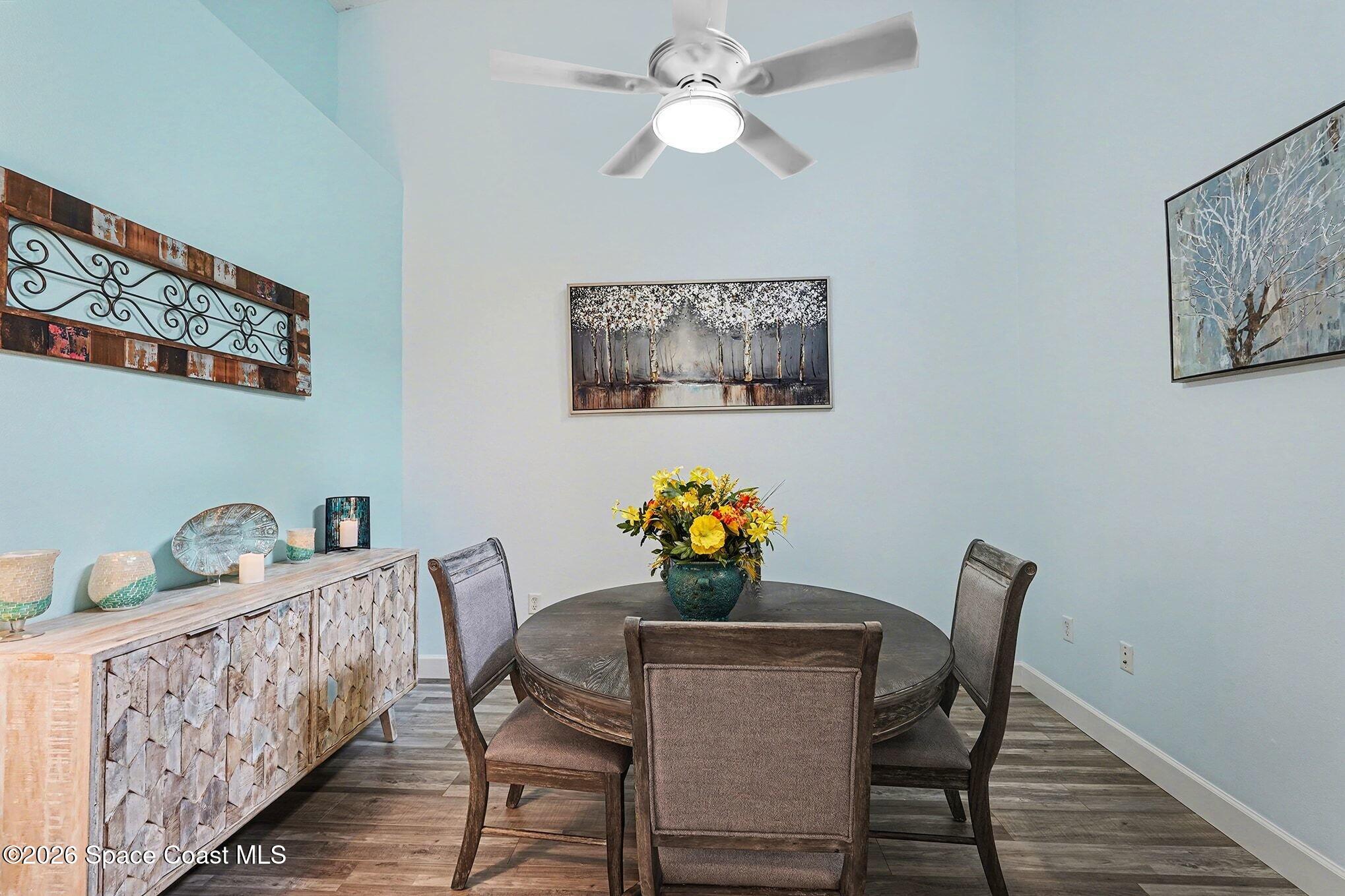 3051 Le Conte Street Melbourne, FL 32940 - Photo 9 of 32 a dining room with furniture and wooden floor