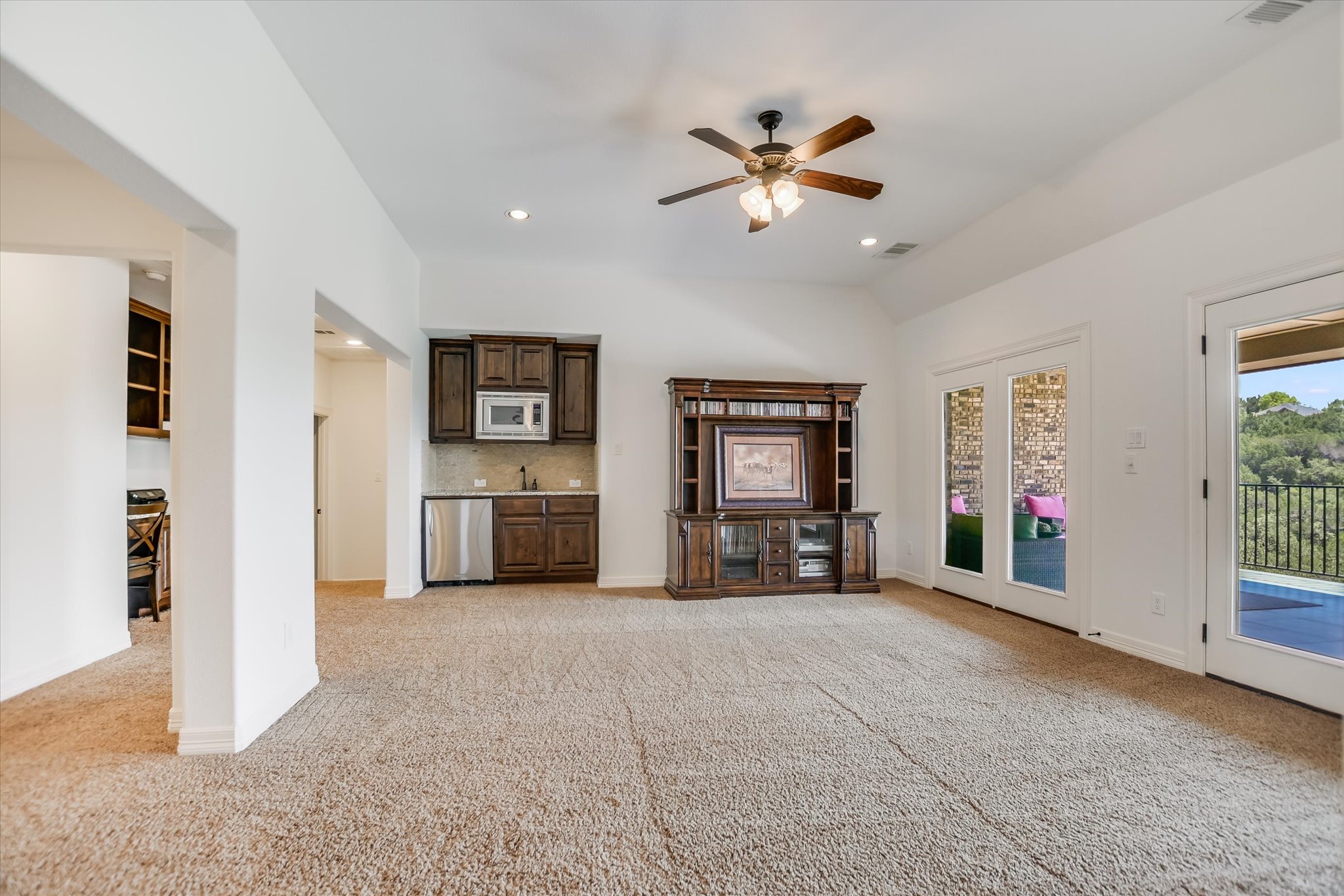 1016 SANTALUZ Path Austin, TX 78732 - Photo 22 of 40 a view of a livingroom with furniture and chandelier fan