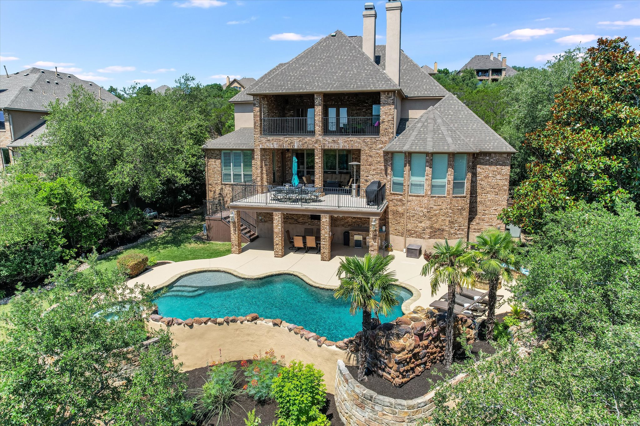 1016 SANTALUZ Path Austin, TX 78732 - Photo 34 of 40 an aerial view of a house with yard swimming pool and outdoor seating