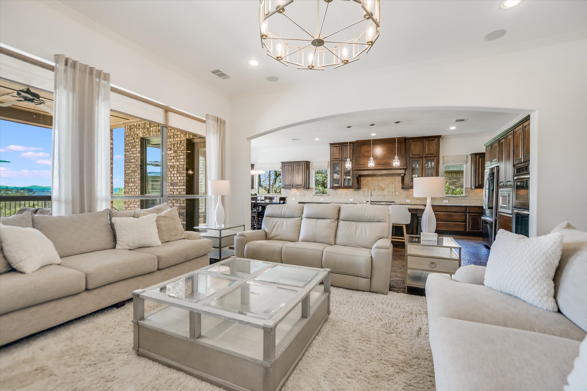 1016 SANTALUZ Path Austin, TX 78732 - Photo 5 of 40 a living room with furniture kitchen view and a large window