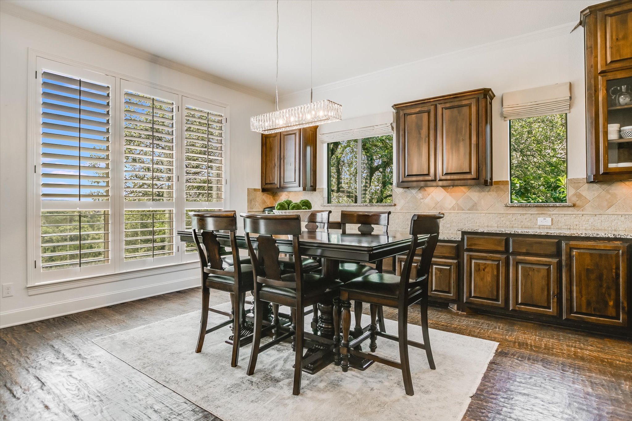 1016 SANTALUZ Path Austin, TX 78732 - Photo 7 of 40 a view of a dining room with furniture window and outside view